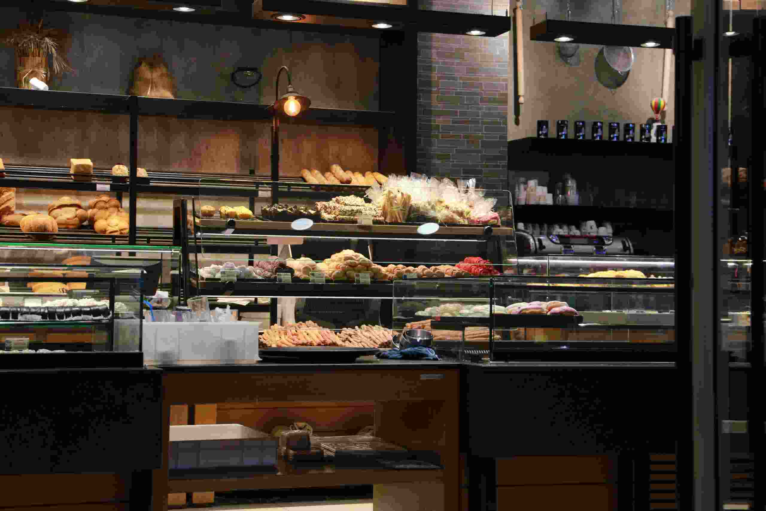 Modern bakery and café display filled with fresh pastries and baked goods, representing Startup Capital for Restaurants, Multi Unit Restaurant Financing, Restaurant Merger Financing, Franchise Restaurant Loans, and Restaurant Oven Financing for growing restaurant and bakery businesses.